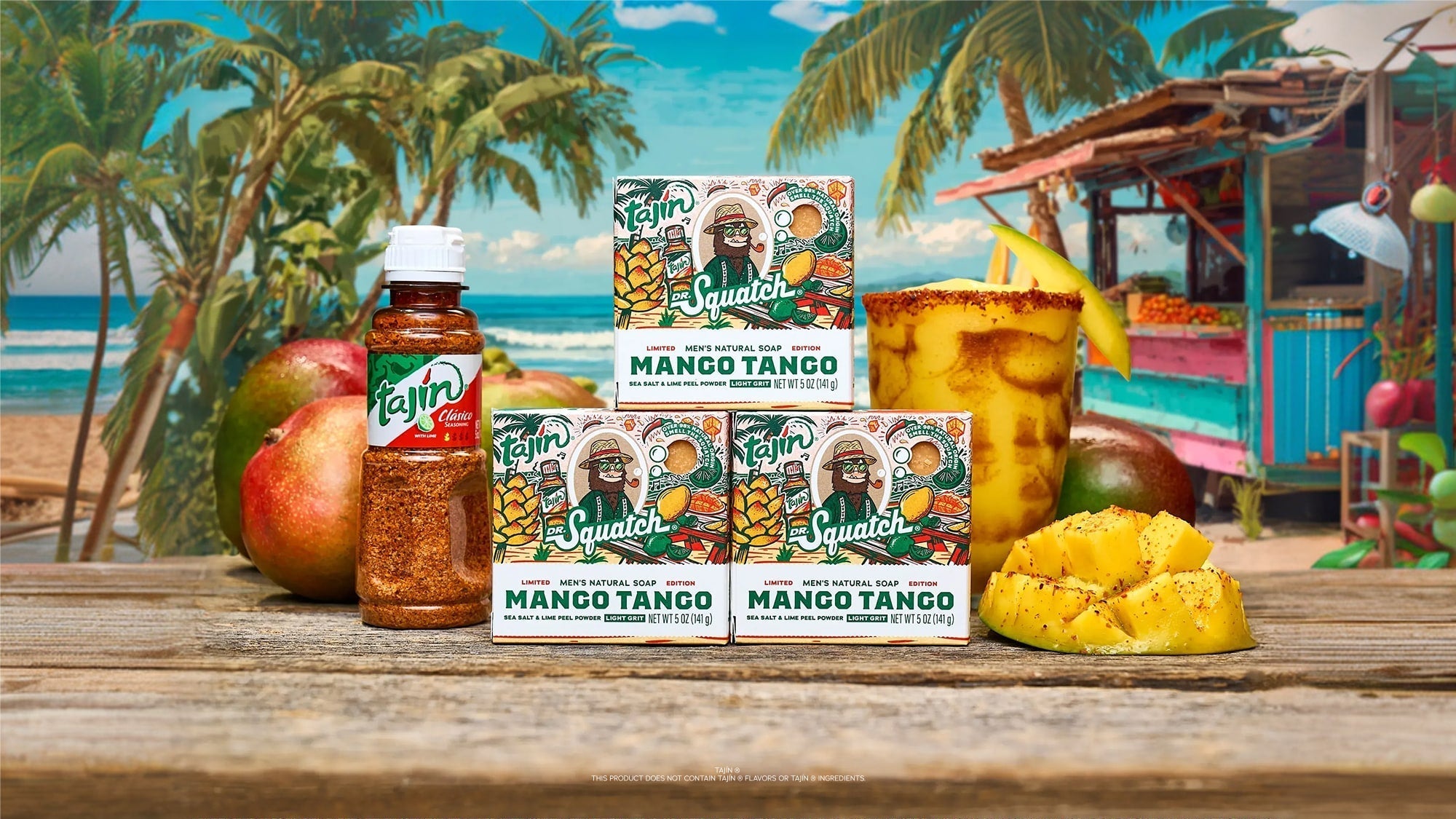 Three Squatch Mango Tango natural soap bars with sea salt and lime peel powder displayed on wooden surface with tropical beach background.