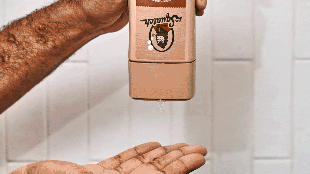 Dr. Squatch Wood Barrel Bourbon Shampoo being used